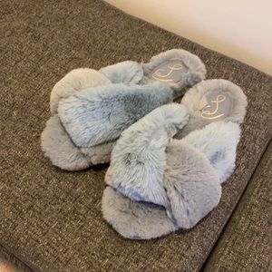 Blue fuzzy slip on slippers